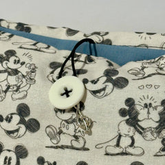 Funda de tela blanco y negro con estampados de Mickey Mouse