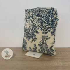 Funda de tela blanca con siluetas clásicas para libros